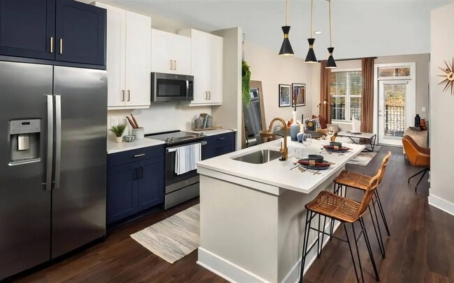 A kitchen island gives you a second counter for prep, plating and cleanup. - Broadstone Upper Westside