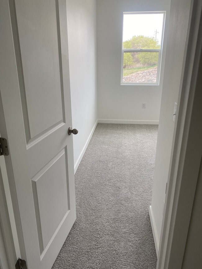 Building Photo - 8345 S Iris Lumi Ln