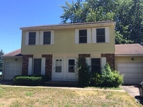 Building Photo - 6839-6841 Woodlake Dr