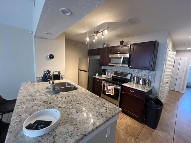 Building Photo - 8718 Rain Forest Pl
