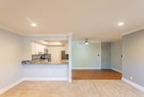 Located at 2101 California St in Mountain View, CA, this single-floor residence offers a thoughtfully designed layout with a blend of modern updates and comfortable living spaces. The living area features soft carpeting, crown molding, recessed lighting, a ceiling fan, and a transition to rich hardwood flooring near the entryway, creating a warm and inviting atmosphere. Sliding glass doors open to a private patio, allowing natural light to fill the space and providing easy access to the outdoors.

The kitchen is outfitted with white shaker-style cabinetry, granite-look countertops, stainless steel appliances including a range, microwave, and refrigerator, and a striking black-and-gray mosaic tile backsplash that adds a contemporary touch.

The bedrooms are carpeted and feature ceiling fans, baseboard heating, natural light from well-placed windows with pleasant outdoor views, and generous storage provided by mirrored sliding-door closets. The bathrooms echo the kitchen's design aesthetic with matching mosaic tile accents, granite-look countertops, undermount sinks, modern brushed nickel fixtures, white cabinetry, and glass-enclosed showers. Overall, the space presents a clean, updated interior with cohesive finishes throughout.
