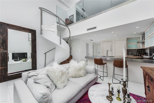 Building Photo - 1 br, 1.5 bath Condo - 7744 Collins Ave Apt 8