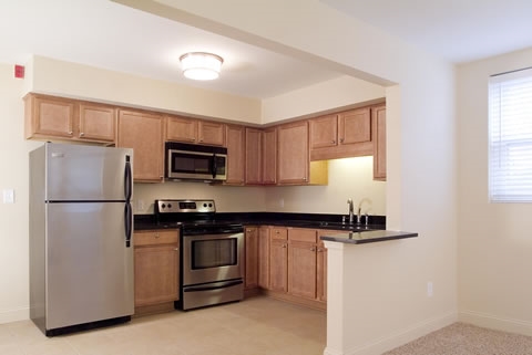 Kitchen - Nesle In Apartments