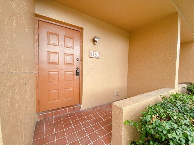 Foto del edificio - 9151 Orchid Tree Ln