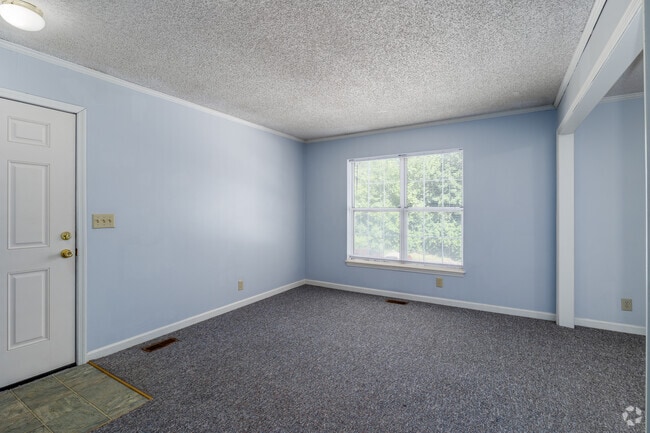 2BR, 2BA - 960SF - Living Room - Deer Creek Apartments