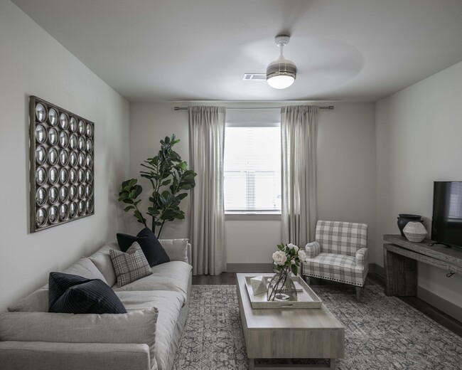 Open living area with Ceiling Fans - Beckett Cottingham