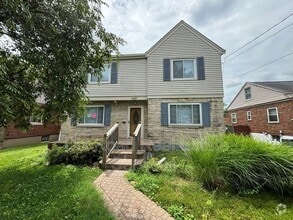 Building Photo - 5587 Surrey Ave