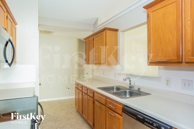 Foto del edificio - 6115 Country Walk Dr