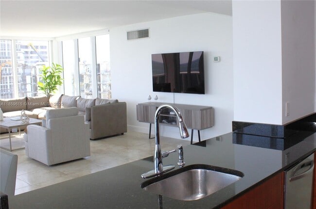 Building Photo - 10275 Collins Ave