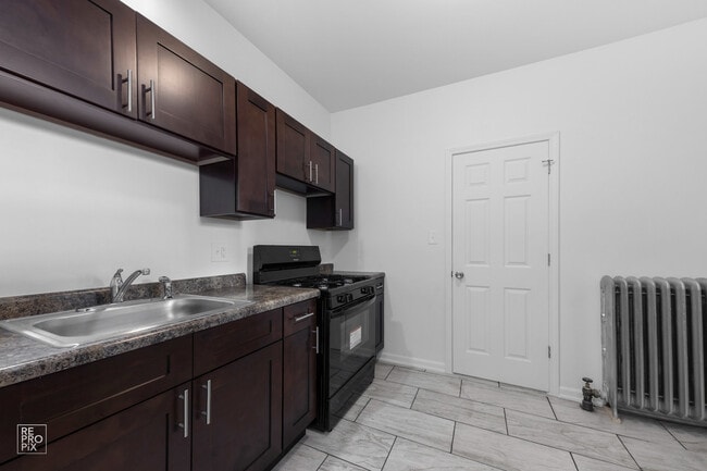 Building Photo - 7451 S Eberhart Ave