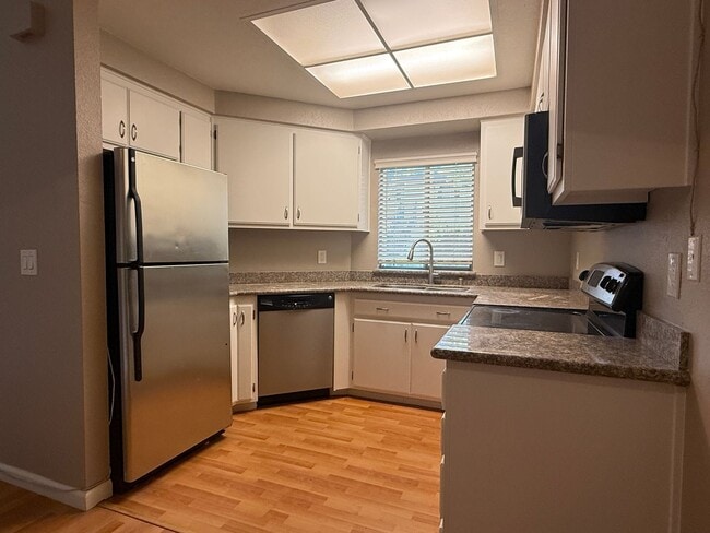 Photo - Remodeled 2 Bedroom 2 Bath Condo in Park-like Cedar Gables Community!