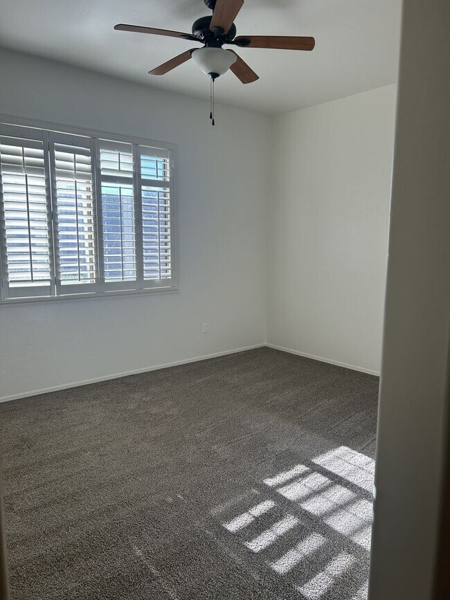 Building Photo - Unfurnished four bedroom large home!  Three car garage