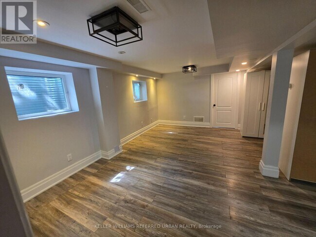 Building Photo - 7009 Lessard Ln