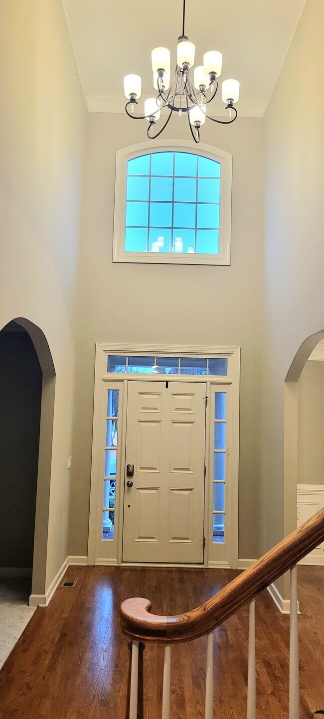 2-story foyer, view at the front door, with a dining room and office space on each side - 12225 Arneson St