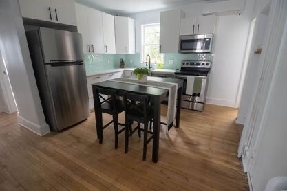 New Everything! Cabinets, Stainless Appliances, Quartz counter tops and Tile backsplash. Gorgeous - 12 Cranston Ave