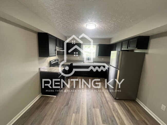 Building Photo - 2-Bed, 1.5-Bath Townhome with large kitche!