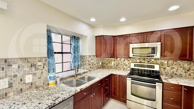 Building Photo - 5704 E Aire Libre Ave
