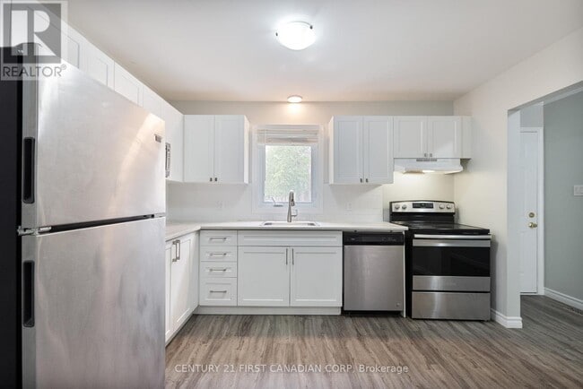 Building Photo - 217 Martinet Ave
