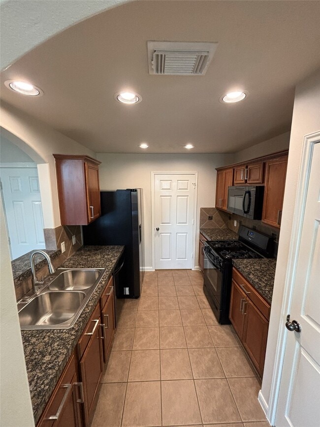 Foto del edificio - 8839 Windfern Trace Dr