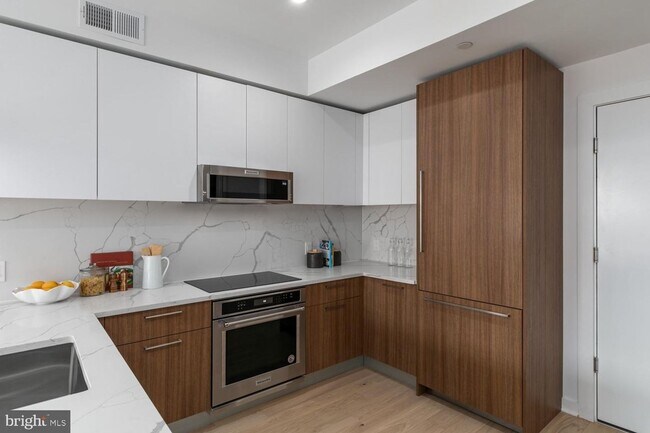 Photo - Elegant, Light-Filled 2BR/2BA with High Ceilings & Walk-In Closets Apartment