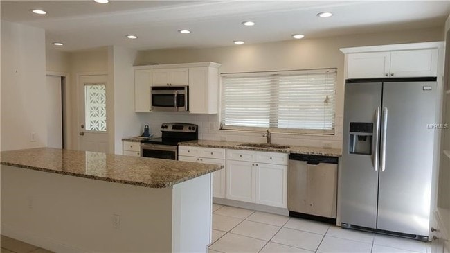 Building Photo - 6916 Alderwood Dr