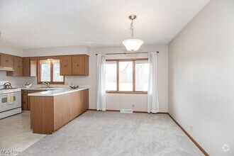 Building Photo - 10791 W River Rd