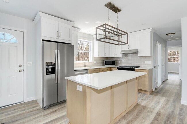 Foto del edificio - 6007 W Jersey Ave