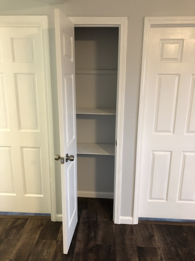 Linen closet between bedrooms - 18 Green Acres Dr