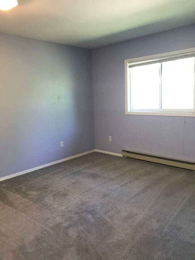 Foto principal - Charming 2-Bedroom Condo Near MSU – Pet Fr...