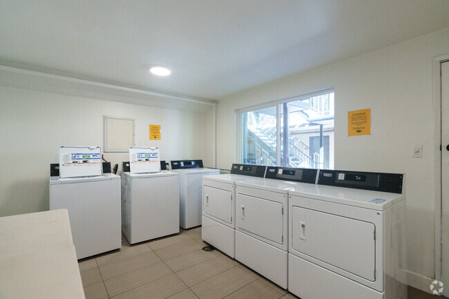 Laundry room - Delta Village Apartments