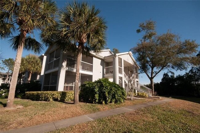 Photo - 2 Bedroom / 2 Bathroom Upstairs Condo with Large Screened Covered Porch