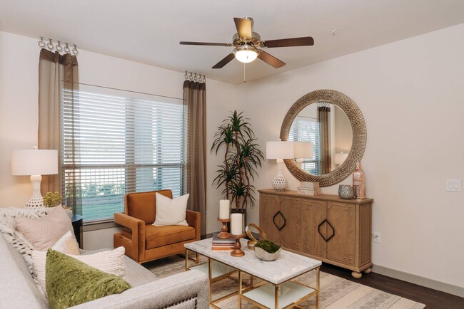 Living Room with Ceiling Fan - Los Robles Apartments