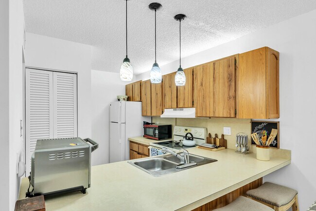 Foto del edificio - 3402 Gardens E Dr