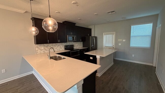 Photo - Immaculate 3/2.5 Townhome w/2-Car Garage in Storey Park of Lake Nona