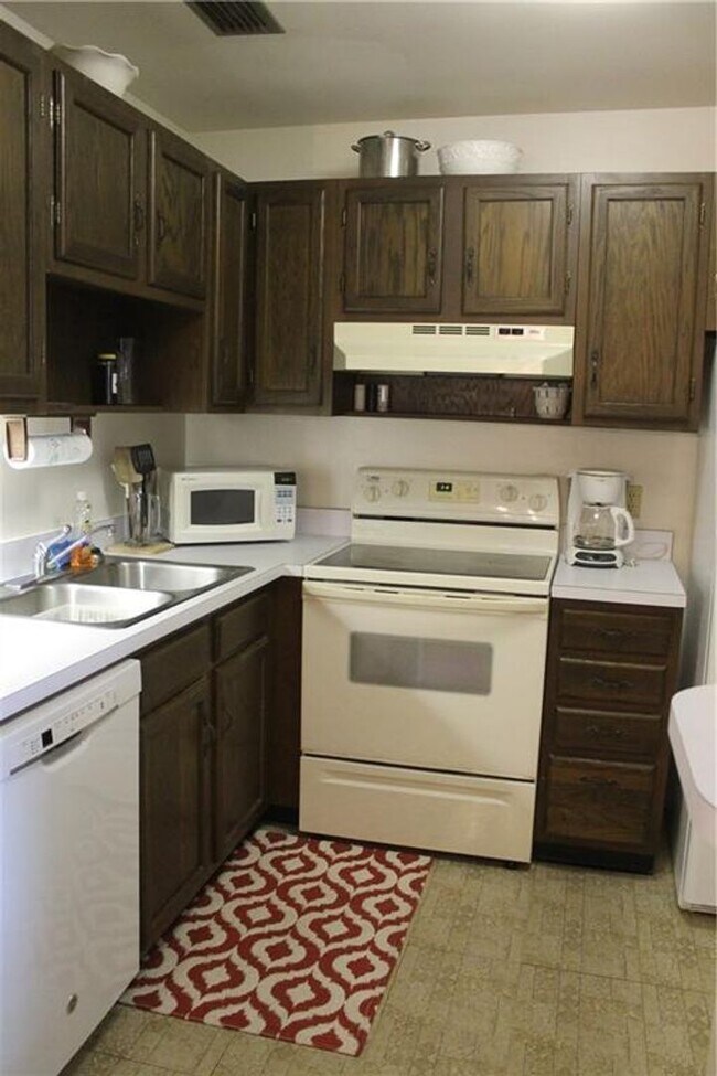 Building Photo - ANNUAL RENTAL 1/1 COMING SOON 55+