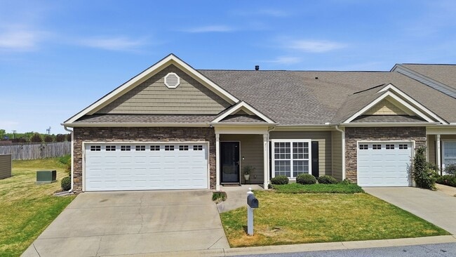 Experience refined, low-maintenance living in this beautifully appointed end-unit townhome - Experience refined, low-maintenance living in this beautifully appointed end-unit townhome