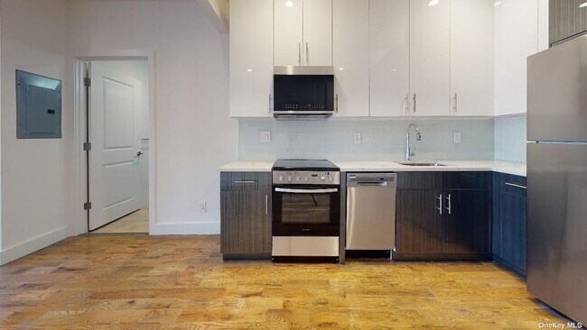 Building Photo - 13828 Queens Blvd