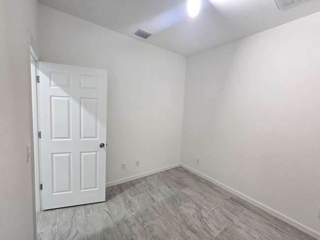 Building Photo - Brand-New 4BR/2BA Luxury Home with 2-Car Garage – Desirable 33971 Location