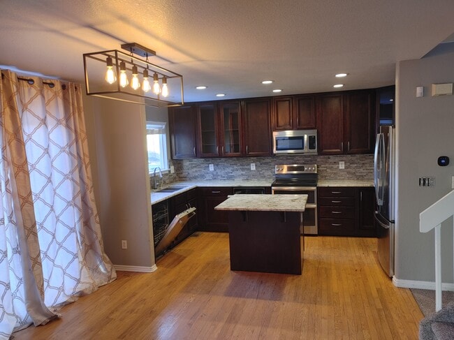 Building Photo - 9485 E Kansas Pl