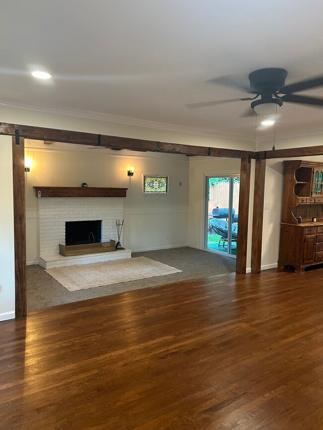 Den with wood burning fireplace - 52 Hammond Rd