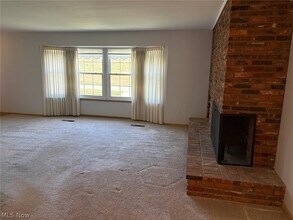 Building Photo - 7010 Carriage Hill Dr