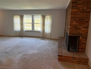Building Photo - 7010 Carriage Hill Dr