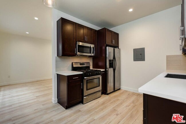 Building Photo - 7223 Willoughby Ave