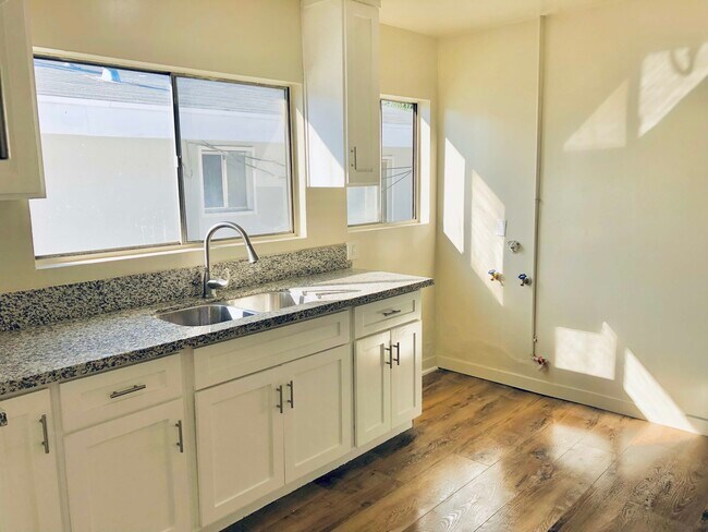 Marble top and Washer/Dryer hook ups - 743 E 85th St