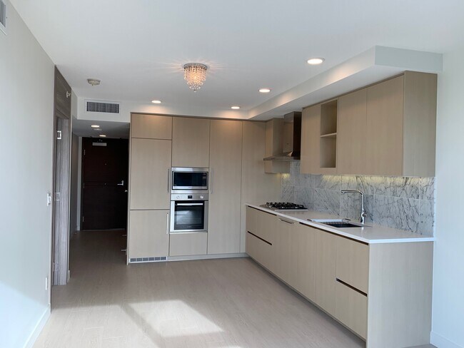 Photo du bâtiment - 721-8800 Hazelbridge Way