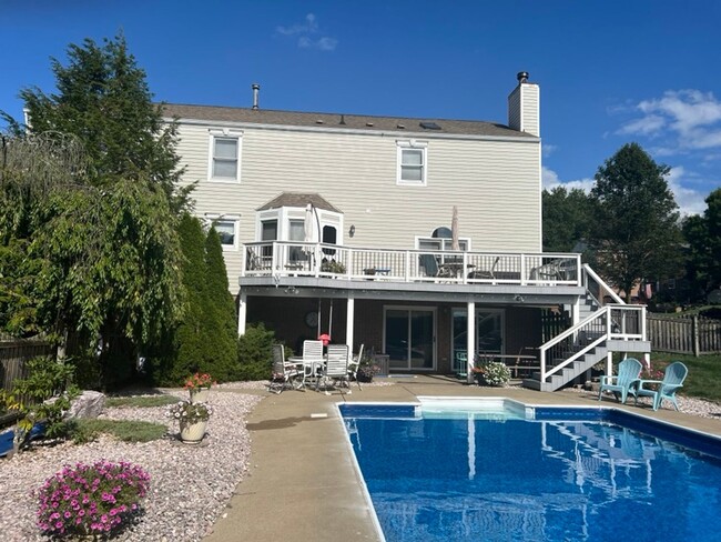 Building Photo - HOME WITH A POOL