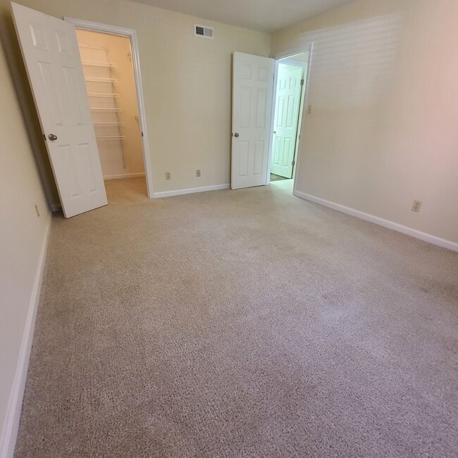 Bedford bedroom with walk in closet - Chesterfield Village Apartments