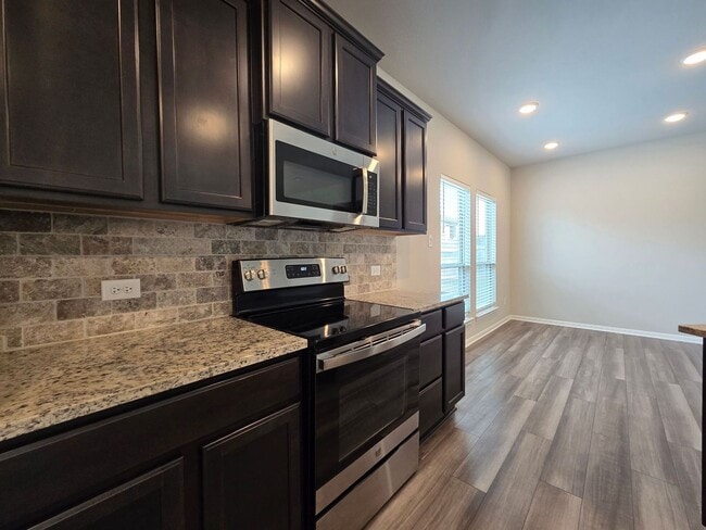 Building Photo - NEW IN MANAGEMENT - RENT REDUCTION - AVAIL...