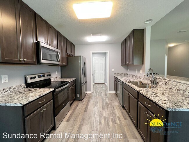 Foto del edificio - 4 br, 2 bath House - 5802 Dogwood Drive E