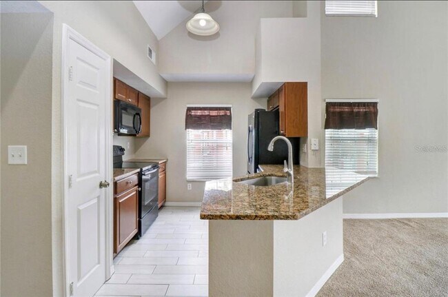 Building Photo - 9506 Lake Chase Island Way
